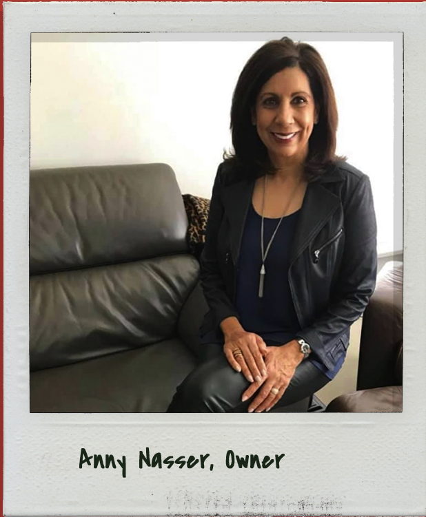 Anny Nasser, owner of Kinder Kampus sitting on a chair
